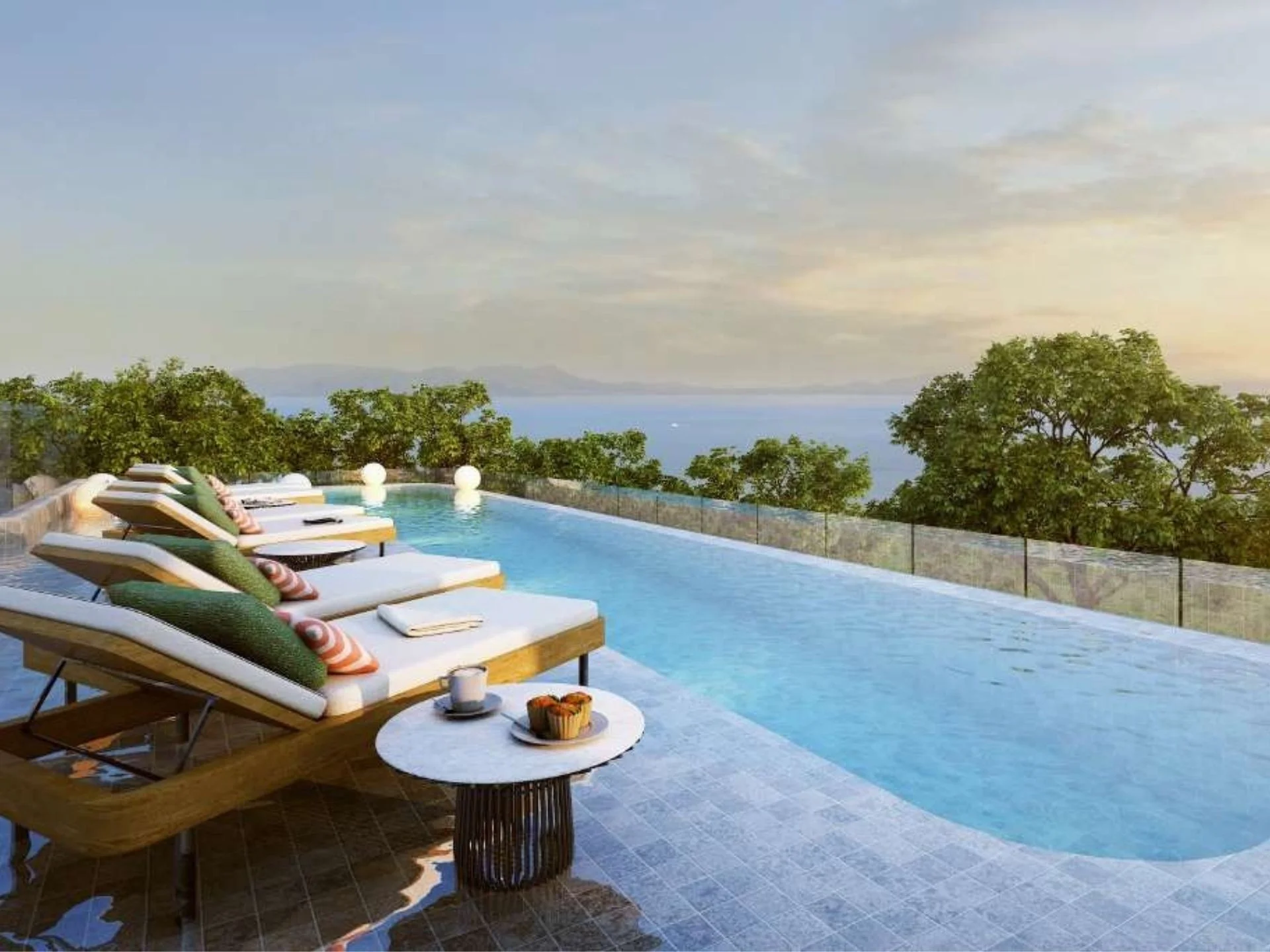 Piscine à débordement avec vue sur la mer à The Title Adora, Rawai
