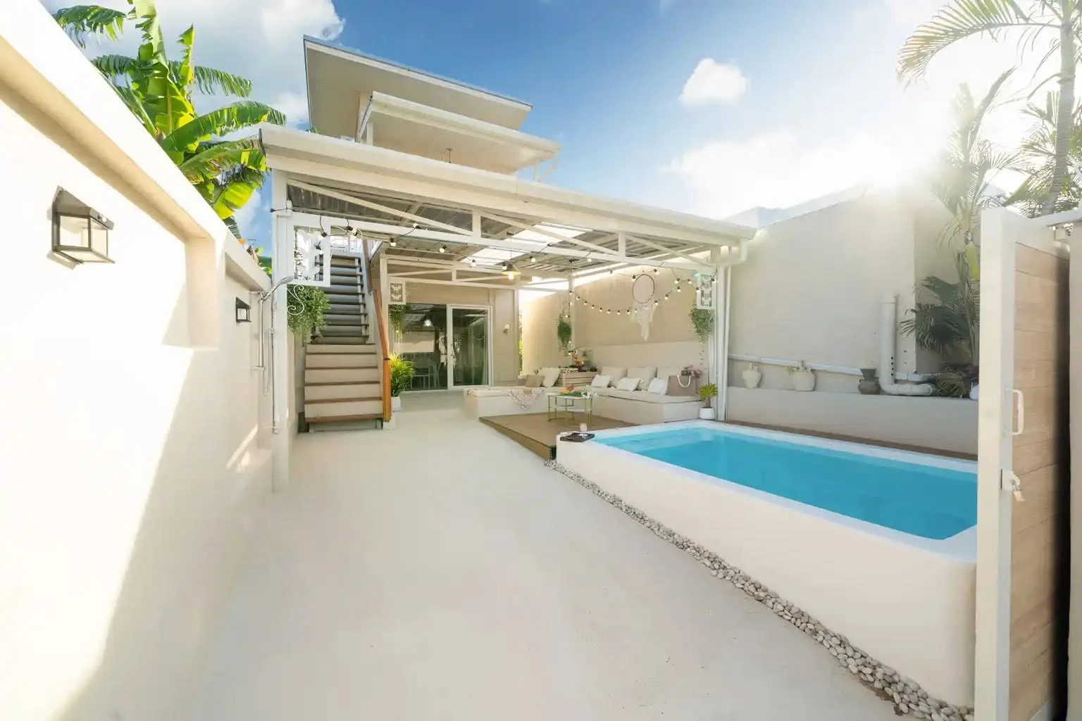 Private villa courtyard with swimming pool and lounge area, Rawai