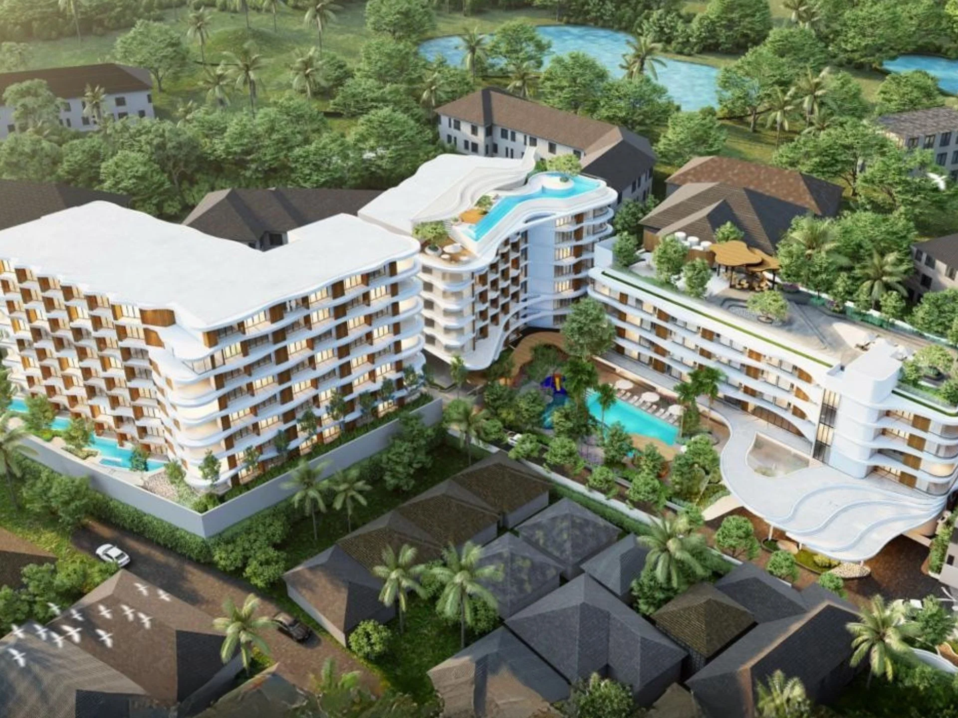 Вид с воздуха на комплекс VIBE Residence с бассейнами и благоустроенной территорией, Каро